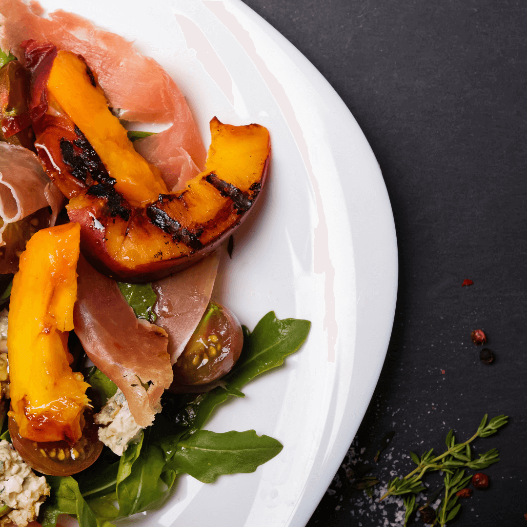 Spring Fizz and Flavor: Pairing HOT ROCKET Baco Noir Pet-Nat with a Refreshing Grilled Peach Salad