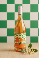 Bottle of Marmalade wine with a decorative label on a checkered green and white background.