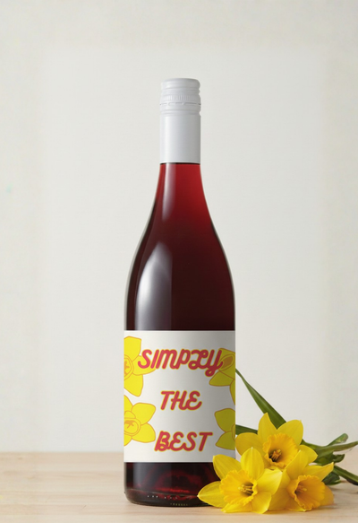 Wine bottle with a label reading 'Simply the Best' and yellow flowers on a light background