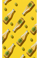 Pattern of beer bottles and green apples on a yellow background