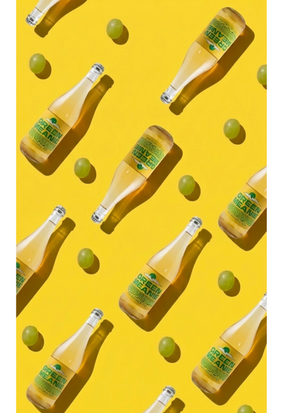 Pattern of beer bottles and green apples on a yellow background