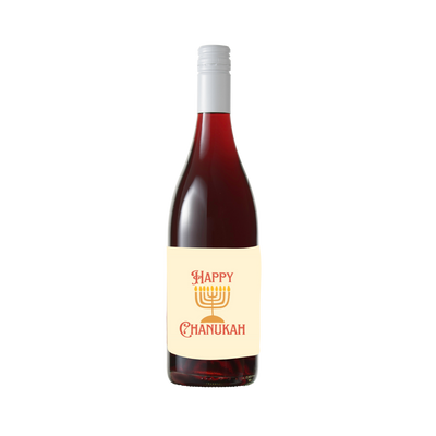 "A bottle of red wine with a festive label reading 'Happy Chanukah' in red text. The label features a golden menorah design on a cream-colored background, evoking a celebratory and elegant feel."