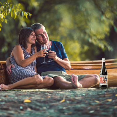Hot rocket wine being enjoyed by a couple on a picnic
