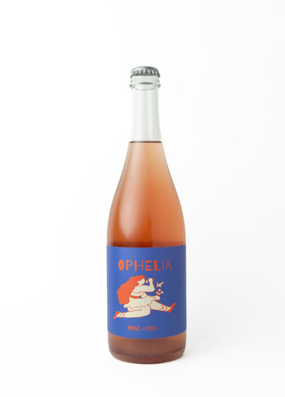 Rose Apple Piquette bottle on display, a refreshing sparkling rosé crafted with local apples and Gamay Noir skins.