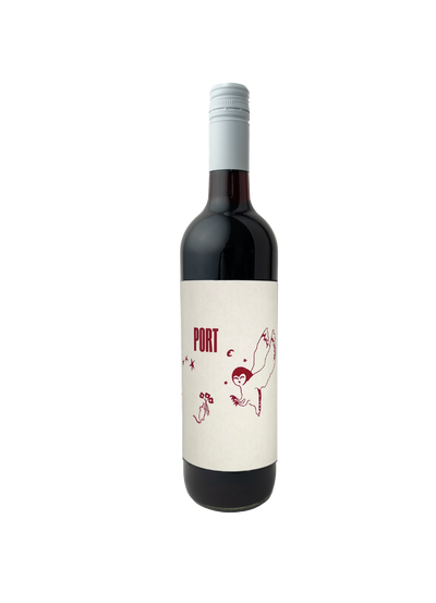 Red wine bottle with a white label on a white background
