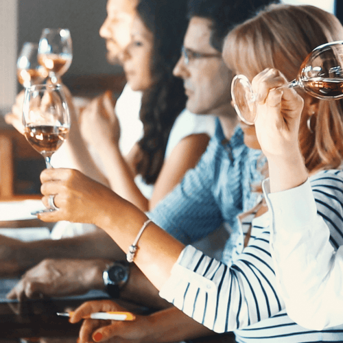 Elegant wine glasses arranged for the Stemware Sensation experience, showcasing the impact of glassware on wine tasting